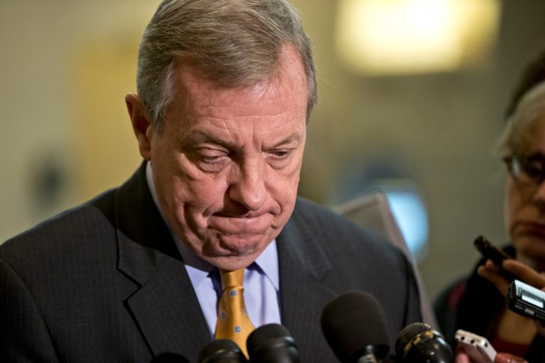 Sen. Dick Durbin, D-Ill., pauses as he speaks to reporters at the Capitol in Washington in December 2012. (AP Photo/J. Scott Applewhite)