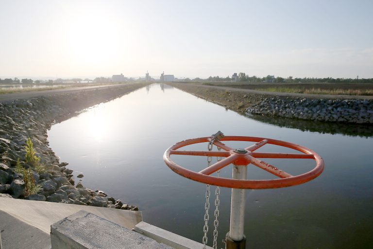 BIGGS, CA - MAY 08:  Water flows in an irrigation canal on May 8, 2015 in Biggs, California. As California enters its fourth year of severe drought, farmers are struggling to keep crops watered as wells run dry and government water allocations have been reduced or terminated. Many have opted to leave acres of their fields fallow.  (Photo by Justin Sullivan/Getty Images)