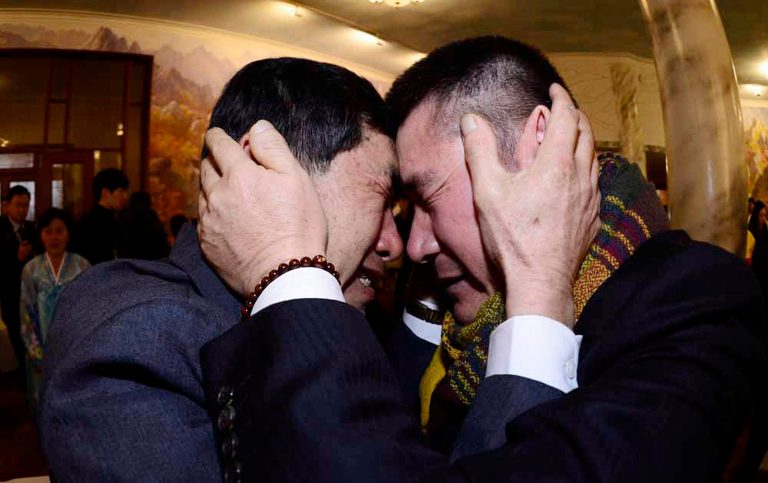 South Korean Park Yang-gon, left, and his North Korean brother Park Yang Soo get emotional as they met during the Separated Family Reunion Meeting at Diamond Mountain resort in North Korea, Thursday, Feb. 20, 2014. Elderly North and South Koreans separated for six decades are tearfully reuniting, grateful to embrace children, brothers, sisters and spouses they had thought they might never see again. (AP Photo/Korea Pool, Park Hae-soo)  KOREA OUT