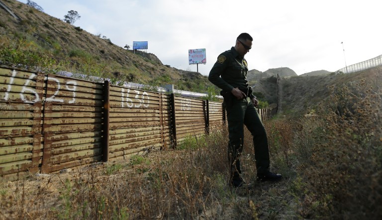 At $2,200 per test, the cost quickly crossed into the millions of dollars. (AP Photo/Gregory Bull)