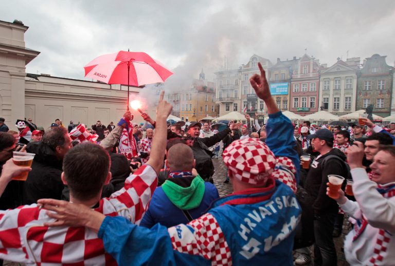   Croatian fans gather prior to the start of the Euro 2012 soccer championship Group C match between Italy and Croatia in Poznan, Poland, Thursday, June 14, 2012. (AP Photo/Gregorio Borgia)  