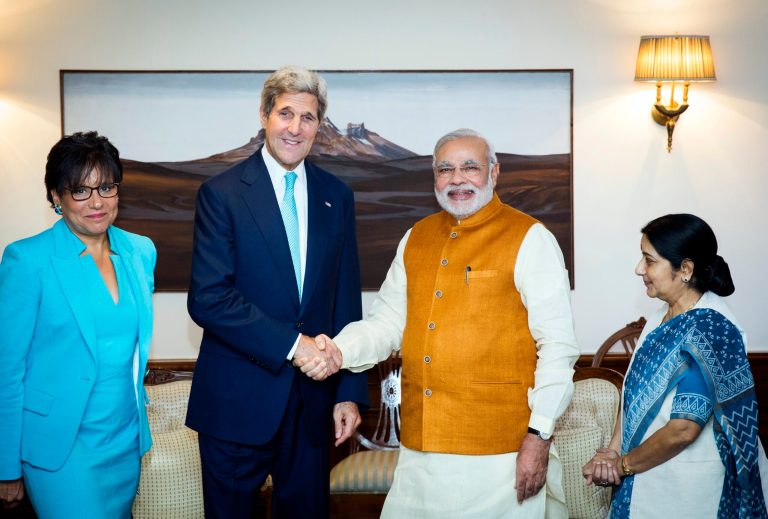U.S. Secretary of State John Kerry shakes hands with Indian Prime Minister Narendra Modi, as Indian Foreign Minister Sushma Swaraj, right, and U.S. Secretary of Commerce Penny Pritzker stand by their sides at Modi's residence in New Delhi, India, Friday, Aug. 1, 2014. Kerry is on a three-day visit, his first following the resounding election win of Modi in May. (AP Photo/Lucas Jackson, Pool)