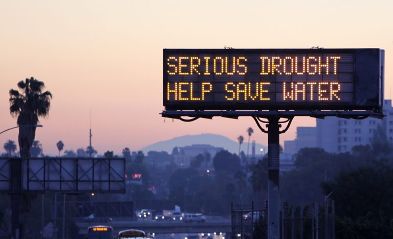 A freeway sign in Los Angeles advises motorists to save water because of the state's severe drought.