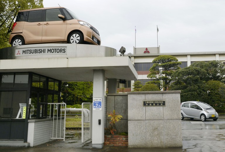 Mitsubishi Motors were raided Thursday over revelations it falsified fuel economy data. (Yuki Sato/Kyodo News via AP)