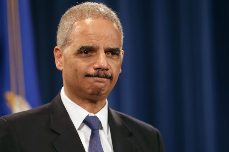 WASHINGTON, DC - MAY 14:  U.S. Attorney General Eric Holder holds a Medicare fraud news conference at which he said he recused himself last year from a national security leak probe in which prosecutors obtained the phone records of Associated Press journalists at the Justice Department May 14, 2013 in Washington, DC. Holder faced a large number of questions about his department's investigation targeting phone records and data from the Associated Press.  (Photo by Chip Somodevilla/Getty Images)