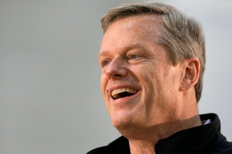 Republican gubernatorial candidate Charlie Baker addresses a crowd during a campaign event, Monday in Swampscott, Mass. (AP Photo/Steven Senne)