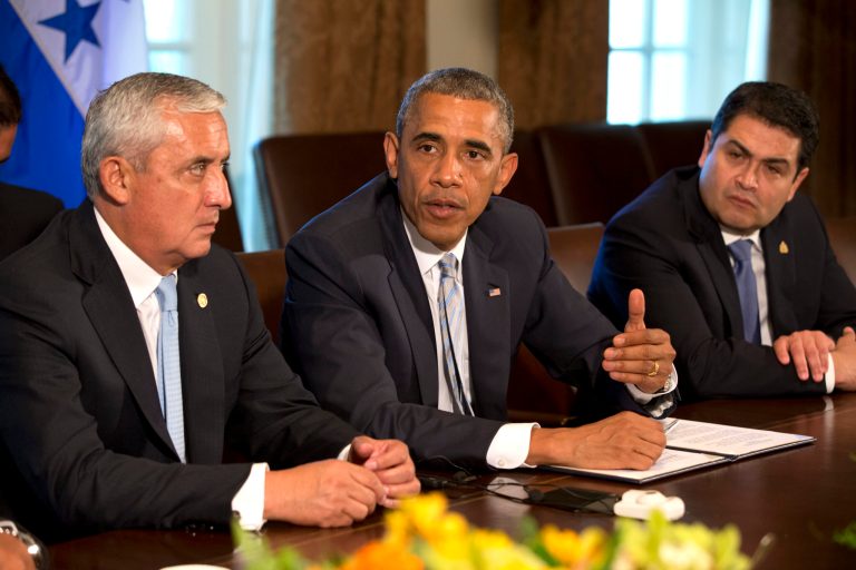 Guatemala's President Otto Perez Molina, left, and Honduran President Juan Hernandez, right, listen as U.S. President Barack Obama speaks to the media, after they met to discuss Central American immigration and the border crisis in the Cabinet Room of the White House Friday, July 25, 2014, in Washington. (AP Photo)