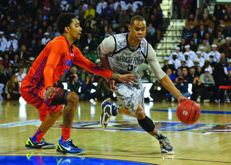 Mike Ehrmann/Getty Images
Markel Starks is averaging 11.1 points and 2.5 assists for 15th-ranked Georgetown this season entering Saturday's game at Marquette.
