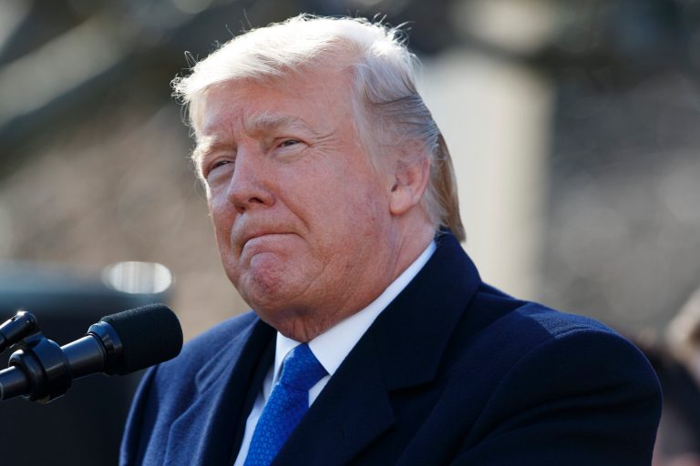 FILE- In this Friday, Jan. 19, 2018, file photo, President Donald Trump speaks to the March for Life participants from the Rose Garden of the White House in Washington. The funding feud, which led to a government shutdown at midnight Friday, Jan. 19, is the second time Trump has dived into a negotiation and come up short on a top priority. (AP Photo/Evan Vucci, File)