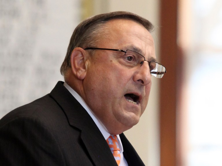   FILE - In this Dec. 5, 2012 file photo, Gov. Paul LePage speaks at the swearing in ceremony for new representatives at the State House in Augusta, Maine. As LePage addressed the newly elected Legislature in early December, his frustration with trackers, the video camera-toting operatives who follow politicians around, boiled over into a brief diatribe that set the session off to a sour start. (AP Photo/Joel Page, File)  