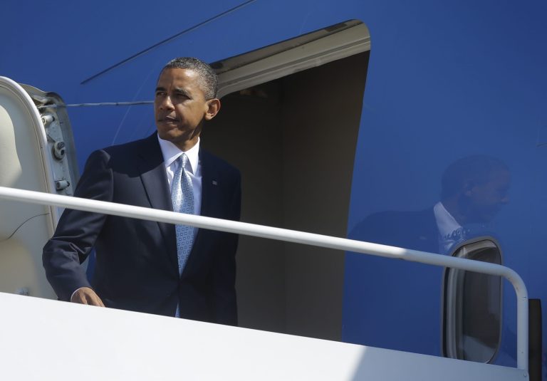 President Barack Obama boards Air Force One. (AP Photo)