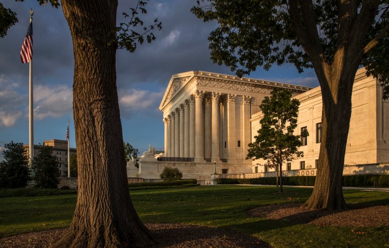 The Supreme Court in Washington is seen at sunset, Tuesday, Oct. 10, 2017. (AP Photo/J. Scott Applewhite)
