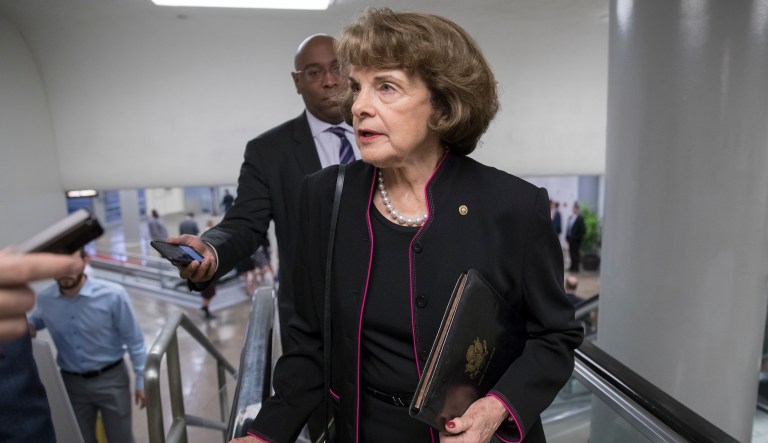 Sen. Dianne Feinstein, D-Calif., speaks to reporters as she arrives at the Capitol in Washington. (AP Photo/J. Scott Applewhite)