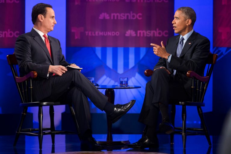 President Obama gestures during a town hall meeting on immigration with MSNBC's Jose Diaz-Balart hosted by Telemundo and MSNBC, Wednesday, Feb. 25, 2015. (AP Photo/Evan Vucci)
