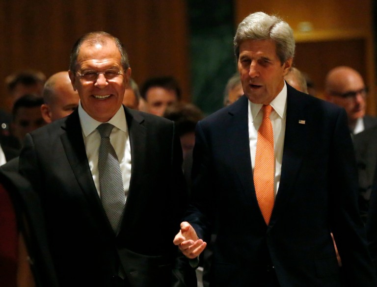 U.S. Secretary of State John Kerry, left, and Russian Foreign Minister Sergey Lavrov, walk in to their meeting room in Geneva, Switzerland, Friday, Sept. 9, 2016, to discuss the crisis in Syria. (Kevin Lamarque/Pool Photos via AP)