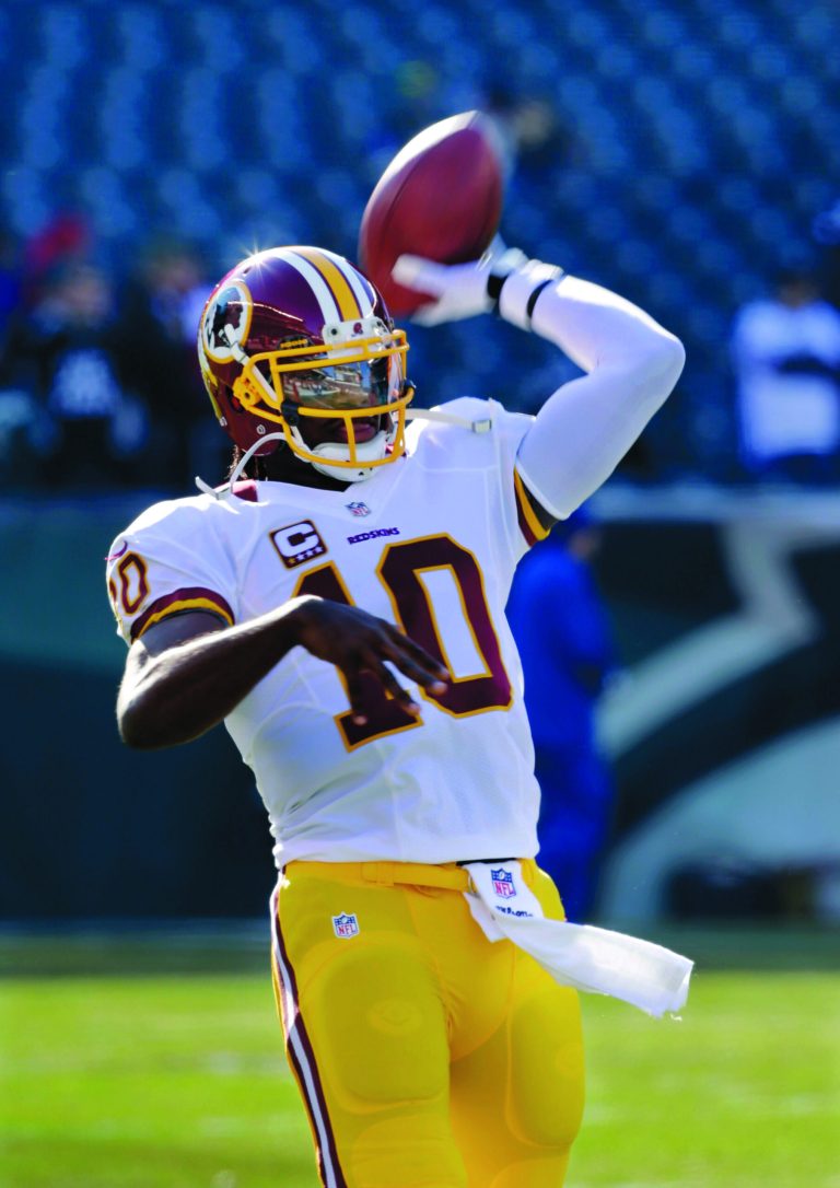 Mel Evans/AP
The Redskins' Robert Griffin arguably already has taken his place among the franchise's top quarterbacks with Sammy Baugh and Sonny Jurgensen.