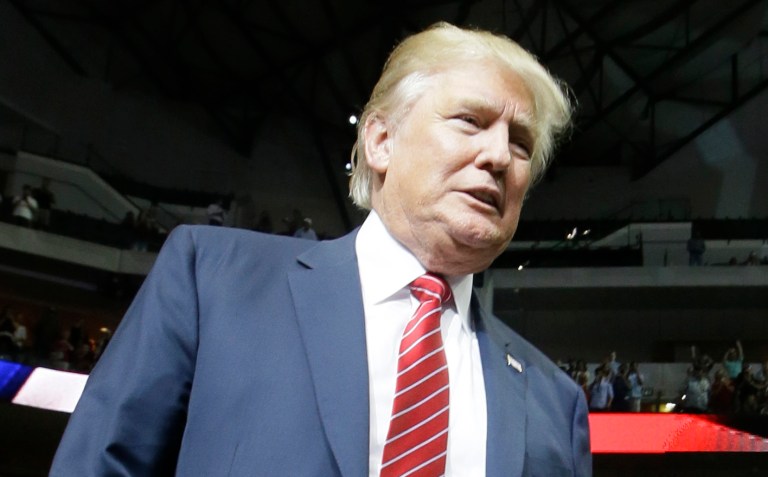 Republican presidential candidate Donald Trump takes the stage for a campaign event in Dallas, Monday, Sept. 14, 2015. (AP Photo/LM Otero)