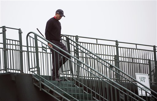 Tiger Woods arrives for his tee time on the first hole at the U.S. Open Championship golf tournament Sunday, June 17, 2012, at The Olympic Club in San Francisco. (AP Photo/The Sacramento Bee, Paul Kitagaki Jr.) MAGS OUT TV OUT MANDATORY CREDIT