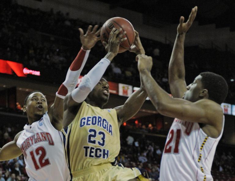 (AP Photo/Cliff Owen)
Maryland guard Terrell Stoglin, 12, and guard Pe'Shon Howard, 21, block Georgia Tech guard Brandon Reed, 23, as he attempts to reach the basket during the first half of their NCAA college basketball game in College Park(AP Photo/Cliff Owen)