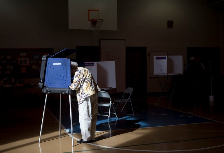 Yvonne Slonaker votes at the South Roanoke precinct at Crystal Spring Elementary School in Roanoke, Va., on Election Day, Tuesday, Nov. 8, 2016. (Erica Yoon/The Roanoke Times via AP)