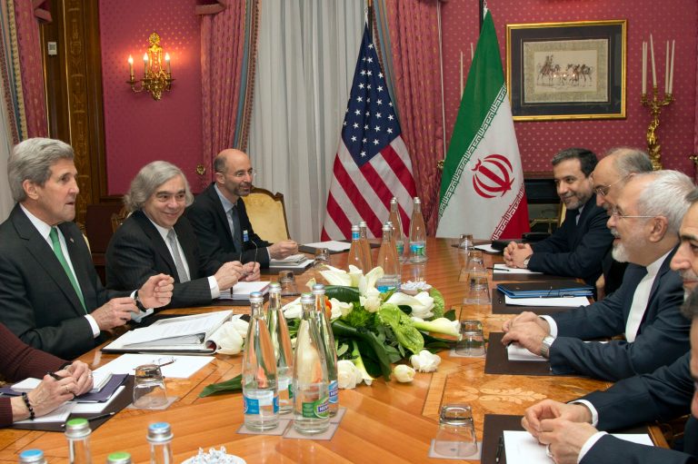 U.S. Secretary of State John Kerry, left, holds a meeting with Iran's Foreign Minister Mohammad Javad Zarif, right, over Iran's nuclear program in Lausanne, Switzerland, Tuesday, March 17, 2015. Also at the negotiating table are U.S. Secretary of Energy Ernest Moniz, second left, and the head of the Atomic Energy Organization of Iran Ali Akbar Salehi, third right. (AP Photo/Brian Snyder, Pool)