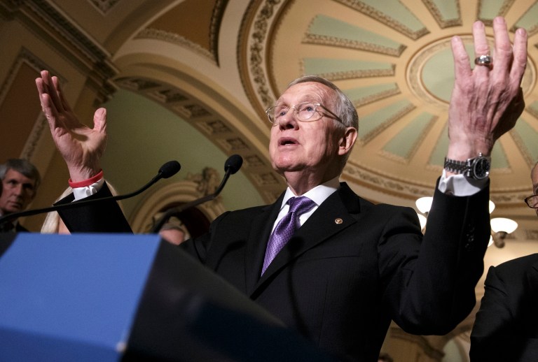Senate Minority Leader Harry Reid is trying to shame Republicans into supporting extension of clean energy tax breaks. (AP Photo/J. Scott Applewhite)