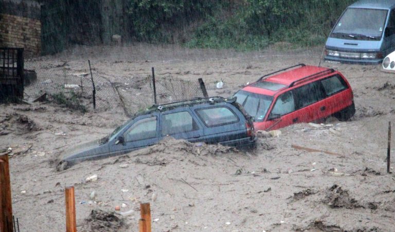 Cars pile up in the flooded area of the Black sea town of Varna, Bulgaria, Thursday, June 19, 2014. Two people and a child are reported dead and four more are missing. Torrential rain caused severe flooding in Bulgaria, sweeping away cars, reducing scores of homes to rubble, the country's civil defense authority said.  (AP Photo/ImpactPressGroup)