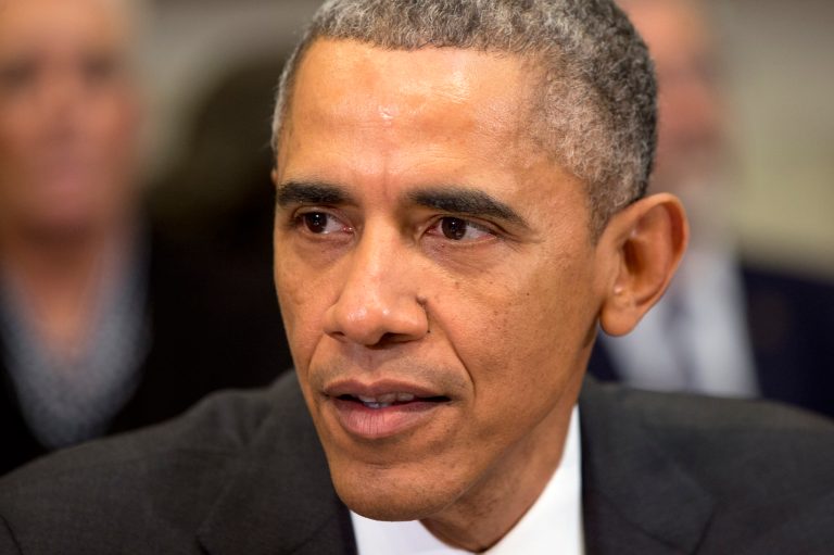 President Barack Obama speaks about Ebola during a meeting with his national security and public health teams, Friday, Dec. 12, 2014, in the Roosevelt Room of the White House in Washington. (AP Photo/Jacquelyn Martin)