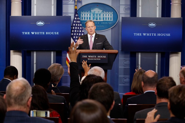 Trump is under heavy criticism in some quarters for abandoning campaign rhetoric. (AP Photo/Evan Vucci)