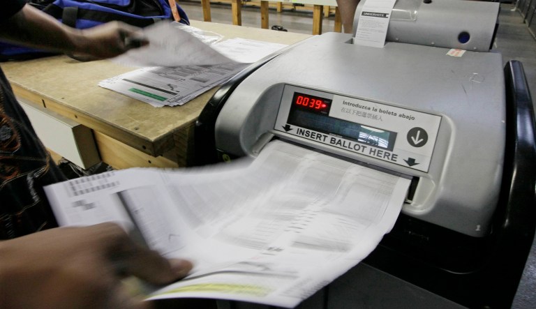 The strongest argument for paper ballots is that they can't be hacked. The second strongest is that there is an independent record of each ballot cast, which some computerized systems lack. (AP Photo/M. Spencer Green File)