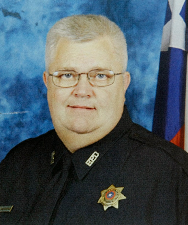   This undated photo provided by the Bellaire Police Department shows Cpl. Jimmie Norman who was on of two people shot and killed by by a motorist who fled following a traffic stop Monday morning Monday, Dec. 24, 2012, in Houston. The confrontation followed a chase that began shortly before 9 a.m. Monday when the suspect sped off in his car rather than pull over as an officer had requested, Houston police spokesman John Cannon said. As the suspect fled, he sideswiped a white truck, which also took off after him, he said. (AP Photo/Bellaire Police Department via Houston Chronicle)  