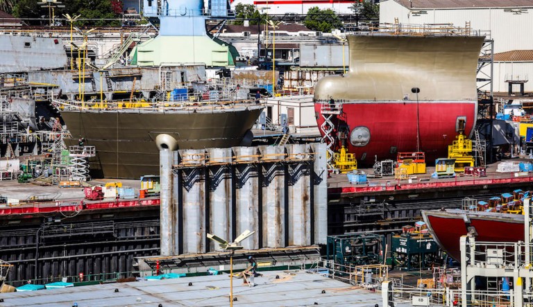 Parts are assembled before being attached to a vessel under construction at the General Dynamics shipyards in San Diego in late 2015. The company is bucking the trend among military contractors by expanding in the information-technology arena.