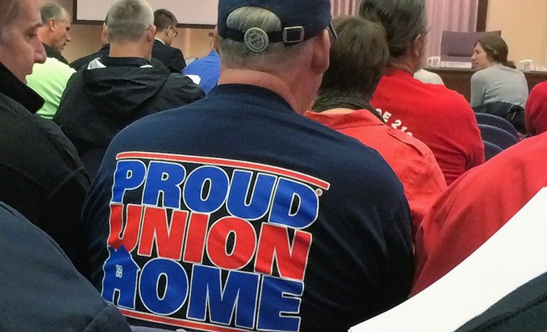 Right-to-work laws prohibit contracts between unions and management that force all workers to join the union or at least pay it a regular fee. Workers have no choice: They pay or are fired. (Russell Lissau/Daily Herald via AP)