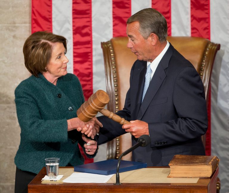 House Speaker John Boehner of Ohio is handed the gavel from House Minority Leader Nancy Pelosi, D-Calif., after being re-elected for a third term to lead the 114th Congress, at the Capitol in Washington, Tuesday, Jan. 6, 2015. (AP Photo/Pablo Martinez Monsivais )