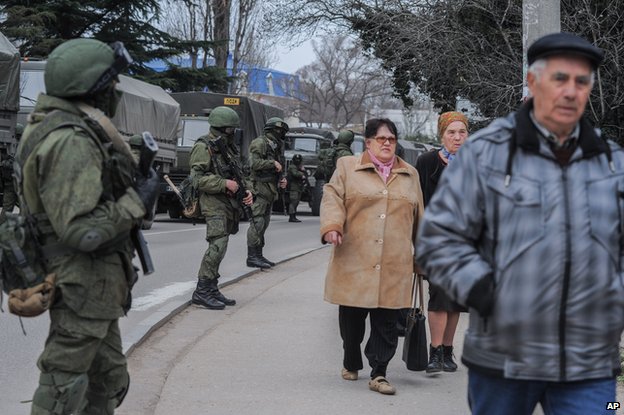 Biden rips Putin’s ‘Little Green Men’ invading Ukraine