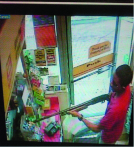 Police search for shotgun-toting man who robbed gas station