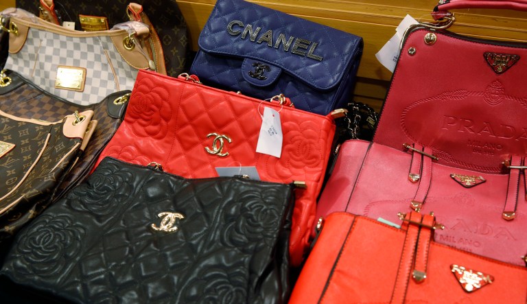 America's two largest customs agencies announced a new record Monday for the number of counterfeit and pirated goods intercepted while being imported to the United States in one year. (AP Photo/Kin Cheung)