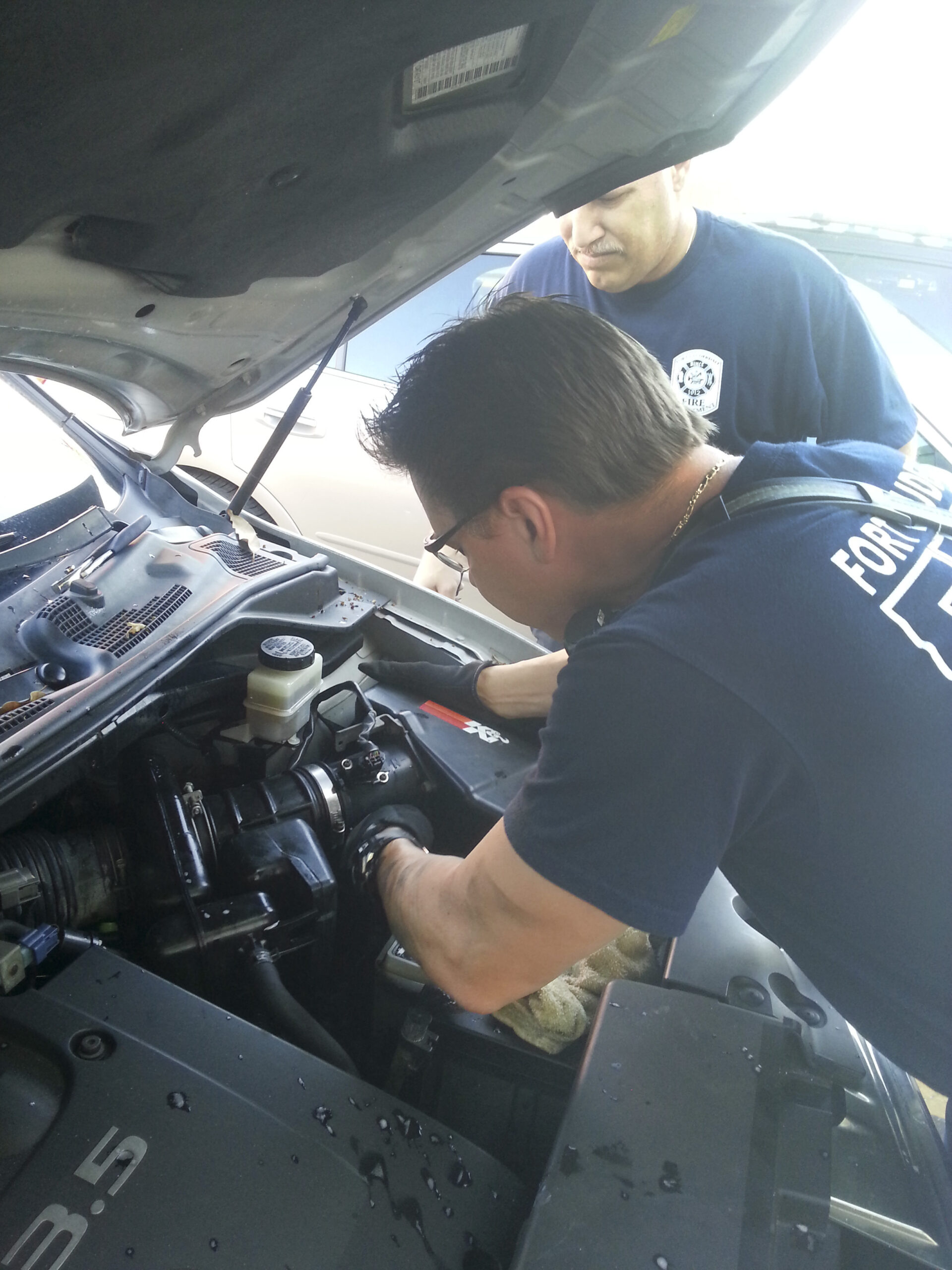 Firefighters rescue 2 kittens entangled inside car