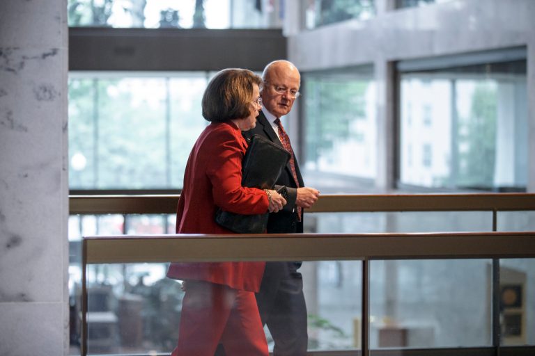 Sen. Dianne Feinstein, D-Calif., left, chair of the Senate Intelligence Committee, walks with National Intelligence Director James Clapper on Capitol Hill following a closed-door briefing, in Washington in September.(AP Photo/J. Scott Applewhite)