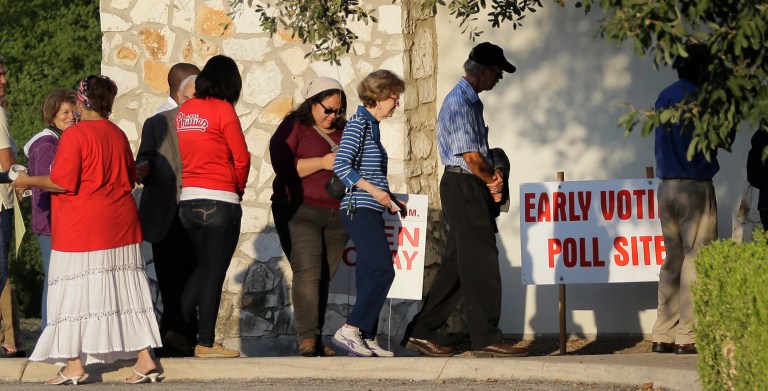 Republicans' refusal to update the Voting Rights Act and the move by red states to impose voter ID laws are signs of a GOP strategy to disenfranchise Democratic-leaning voters, a White House spokesman said.Â (AP Photo/Eric Gay)