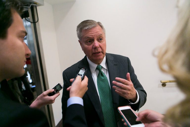 Sen. Lindsey Graham, R-S.C., speaks with reporters Wednesday, June 4th, 2014, as he heads to a senators closed meeting with Obama administration officials to discuss the release of Army Sgt. Bowe Bergdahl. (Examiner/Graeme Jennings)