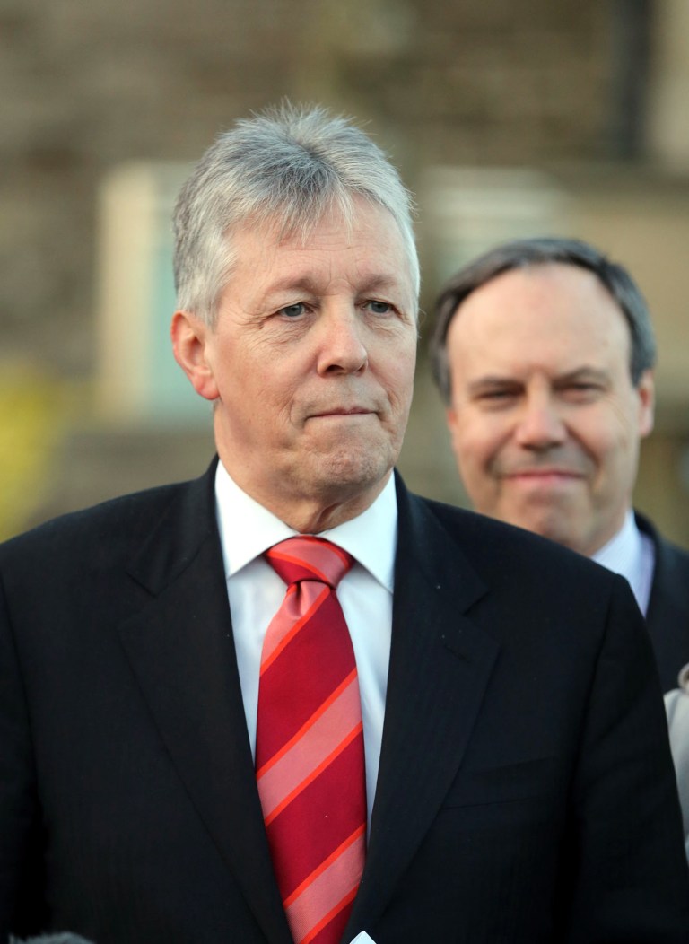 Northern Ireland First Minister Peter Robinson pauses as he speaks to the media at Stormont, Belfast, Northern Ireland, Thursday, Feb. 27, 2014.  Robinson has welcomed the inquiry set up to look into the NI secret letters row and also said he was happy with the terms of reference for the inquiry.  He had threatened to resign over the issue of 'On the Runs' - republican paramilitary suspects who were given assurances that they were not being sought by police.  (AP Photo)