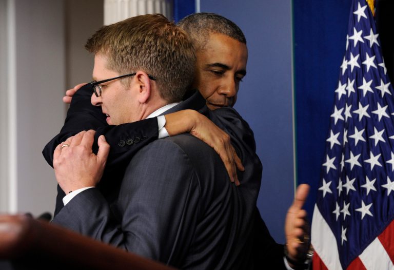 President Obama gives White House press secretary Jay Carney a hug after announcing that Carney will step down on May 30. (AP/Susan Walsh)