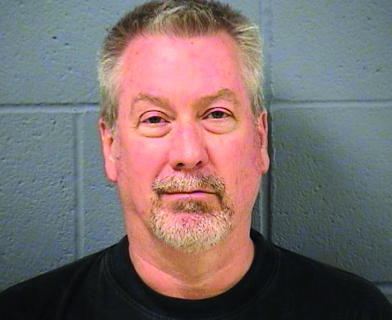 FILE - This May 7, 2009 file photo provided by the Will County, Ill., Sheriff's office shows former Bolingbrook, Ill., police officer Drew Peterson. Peterson is charged with first-degree murder in the 2004 drowning death of his former wife Kathleen Savio. He has pleaded not guilty. (AP Photo/Will County Sheriff's Office, File)