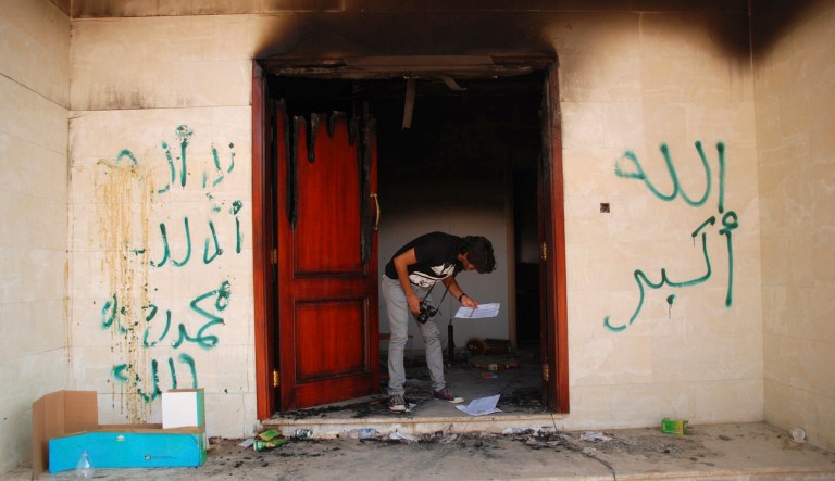 The U.S. Consulate in Benghazi, Libya, after an attack that killed four Americans, including Ambassador Chris Stevens, in 2012. Security officers at the consulate claimed that an employee who reported to former Secretary of State Hillary Clinton pressured them to be quiet about the lack of adequate security just before the terror attack.(AP Photo/Ibrahim Alaguri)