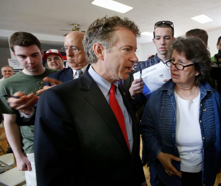 Republican presidential candidate, Sen. Rand Paul, R-Ky. is questioned after a town hall meeting at the Loins Club hall with area residents, Monday, May 11, 2015, in Londonderry, N.H. (AP Photo/Jim Cole)