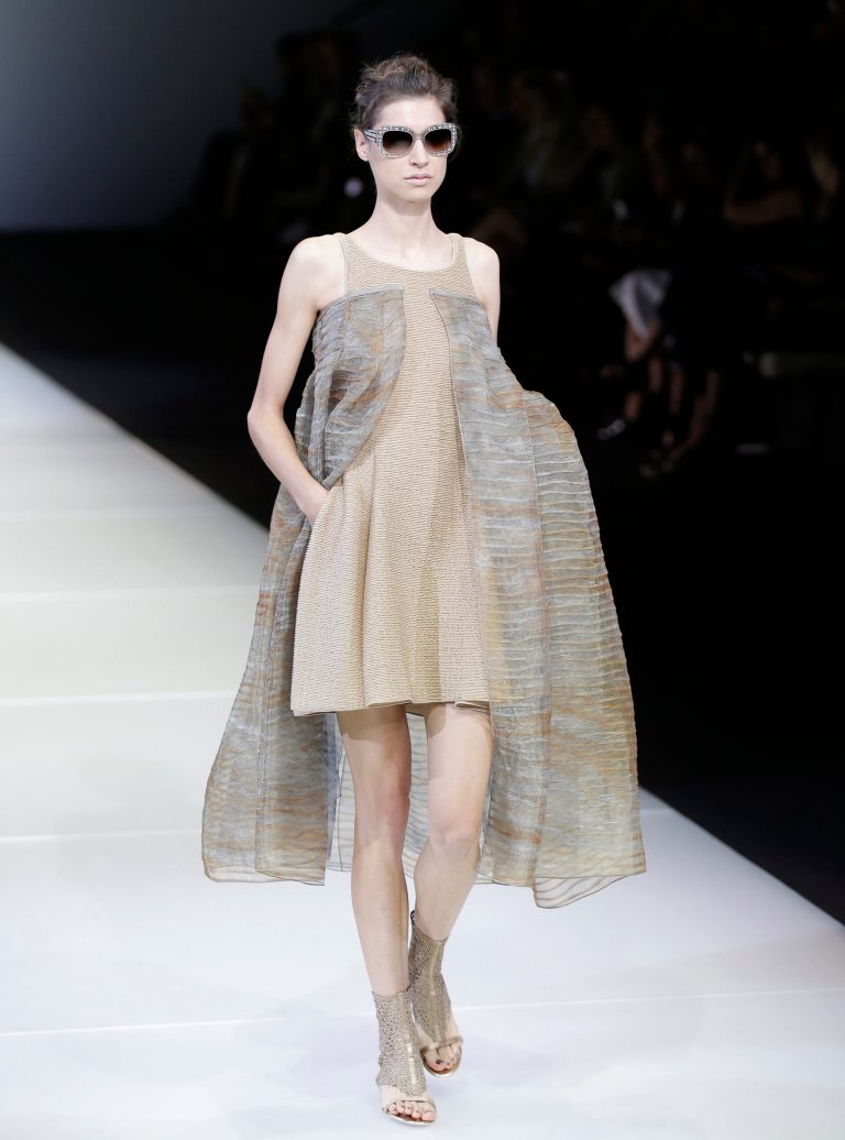 A model wears a creation for Giorgio Armani women's Spring Summer 2015 collection, part of the Milan Fashion Week, unveiled in Milan, Italy, Saturday, Sept. 20, 2014. (AP Photo/Antonio Calanni)