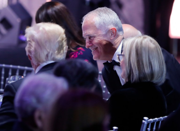 Australian Prime Minister Malcolm Turnbull and his wife Lucy Turnbull join President Donald Trump as they take their seats during a dinner aboard the USS Intrepid, a decommissioned aircraft carrier docked in the Hudson River in New York, Thursday, May 4, 2017. (AP Photo/Pablo Martinez Monsivais)