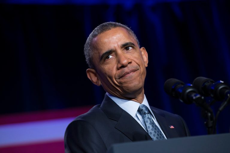 President Barack Obama pauses while speaking at the Democratic National Committee winter meeting in Washington, Friday, Feb. 20, 2015. (AP Photo/Evan Vucci)