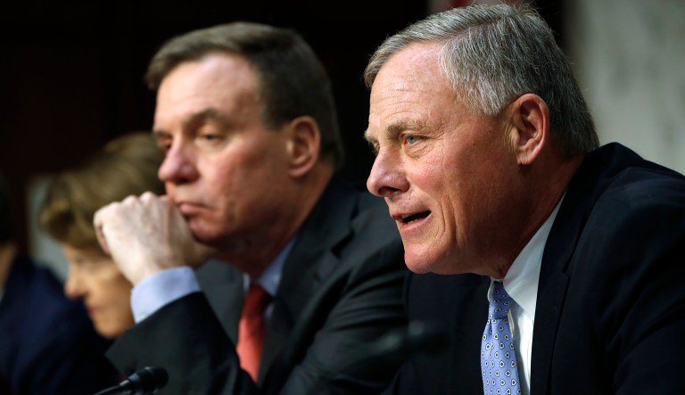 The Senate Intelligence Committee, which includes Sen. Richard Burr, R-N.C., right, and Sen. Mark Warner, D-Va., advanced its own reauthorization of Section 702 of the Foreign Intelligence Surveillance Act, which would extend the warrantless surveillance program through the end of 2025, late last month. But other groups in Congress have different ideas. (AP Photo/Jacquelyn Martin)